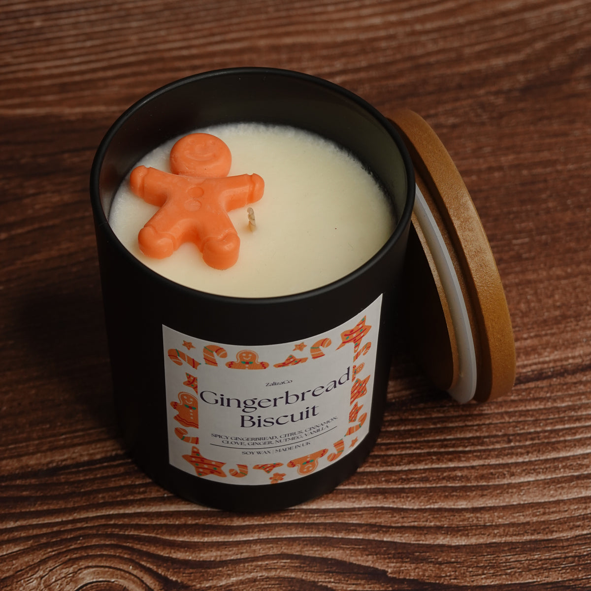 3D gingerbread man topper candle black jar