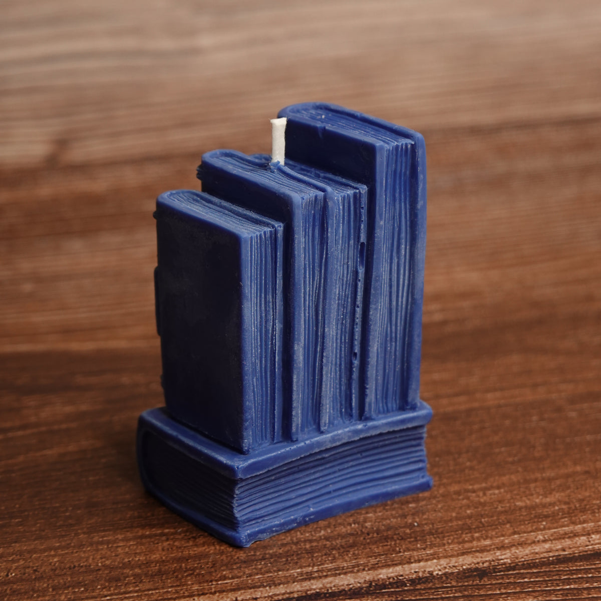 Book stack pillar candle turquoise purple