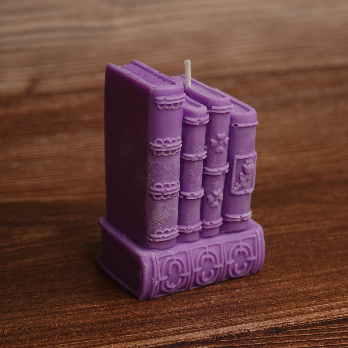 Book stack pillar candle turquoise purple