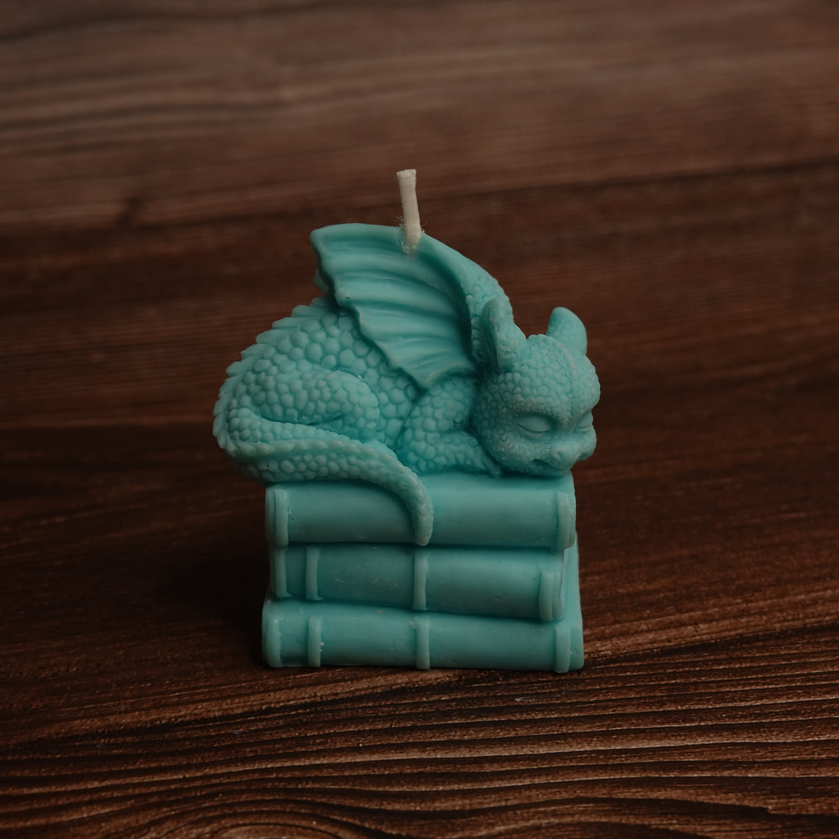 Dragon and books pillar candle turquoise