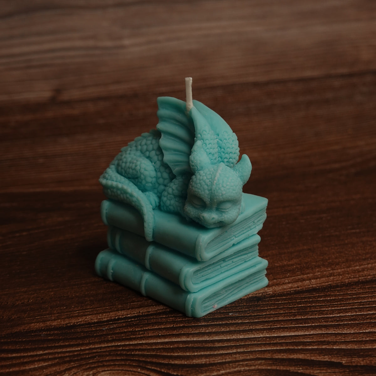 Dragon and books pillar candle turquoise