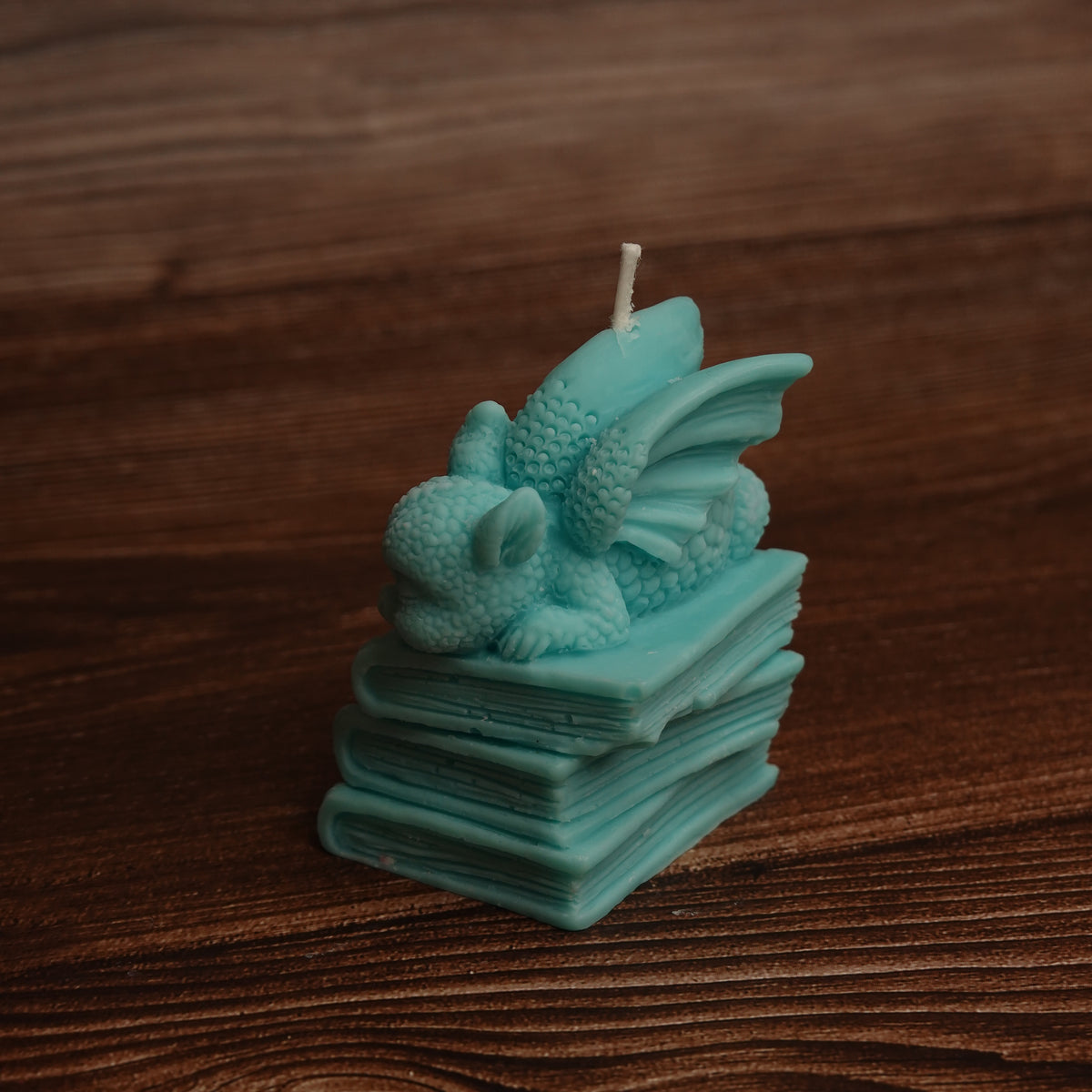 Dragon and books pillar candle turquoise