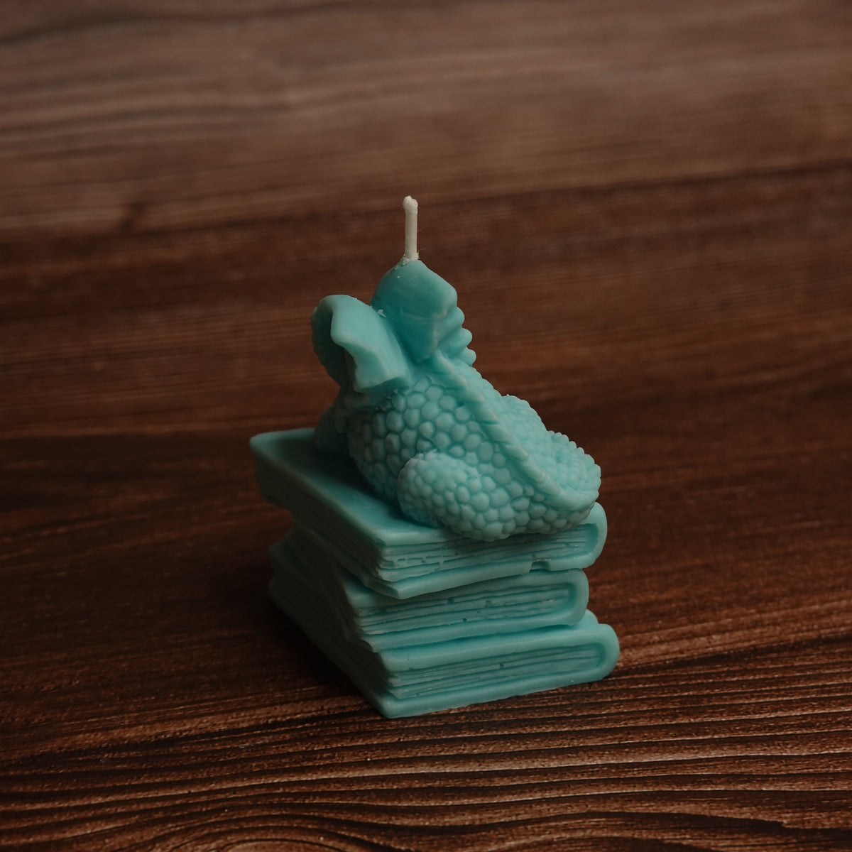 Dragon and books pillar candle turquoise